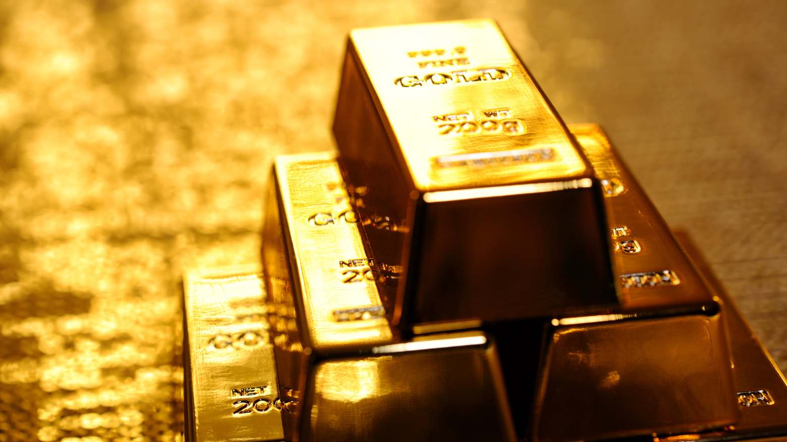 Ouro recua e termina semana com perda de quase 1% em meio a incertezas sobre EUA e Irã - Imagem do artigo